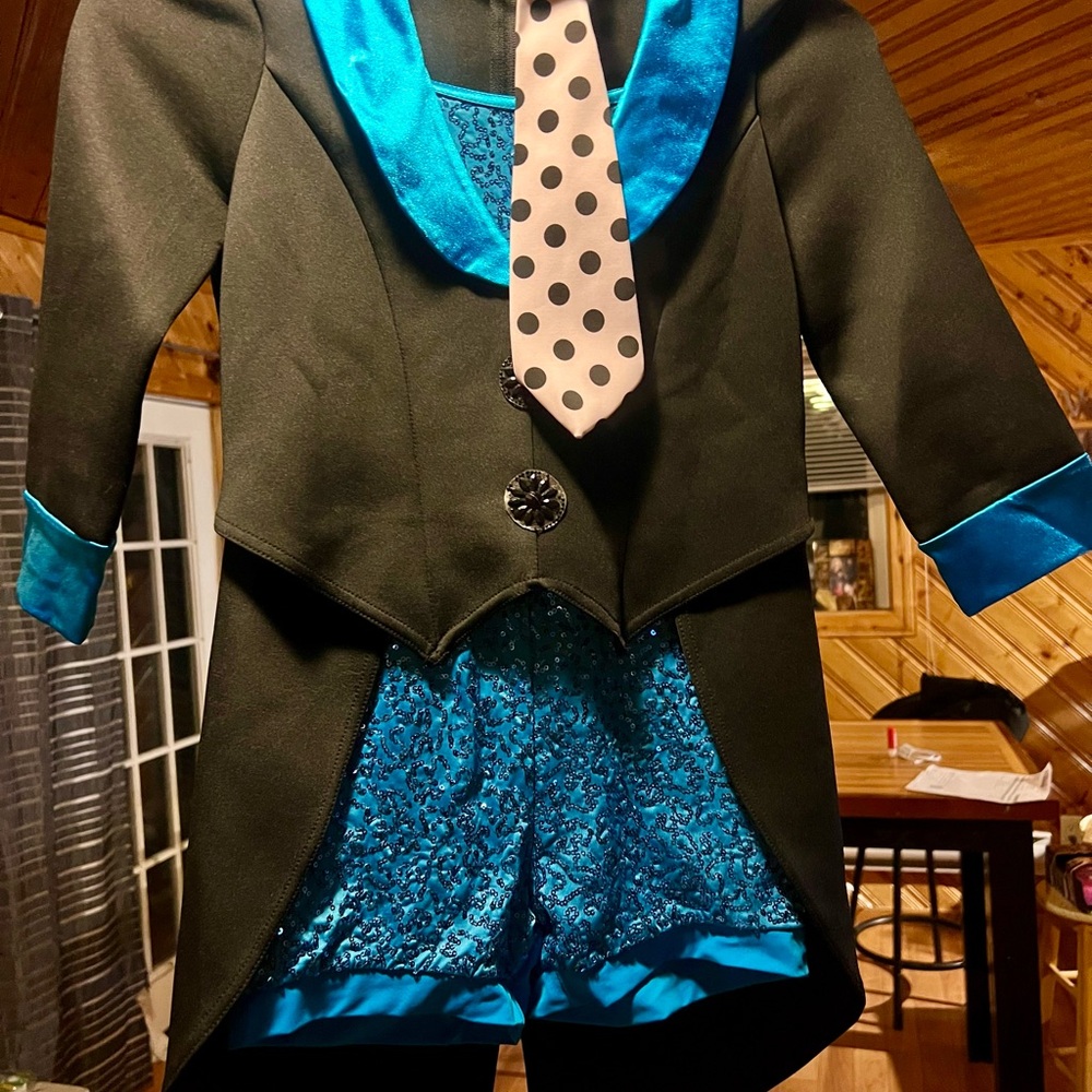 Chic Black Tuxedo with Blue Accents and Polka Dot Tie